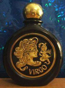 Virgo vintage decanter blue background