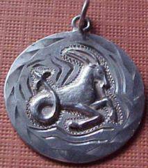 capricorn vintage silver medal